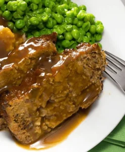 Cajun Meatloaf Pioneer Woman served with mashed potatoes and steamed vegetables