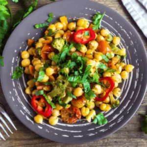 Healthy dense bean salad in a mason jar, perfect for meal prep, with colorful beans, veggies, and dressing layered for freshness