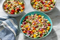 Mediterranean Dense Bean Salad with fresh vegetables and herbs
