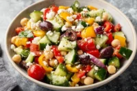 The Easiest Chickpea Greek Salad with feta, olives, and colorful peppers