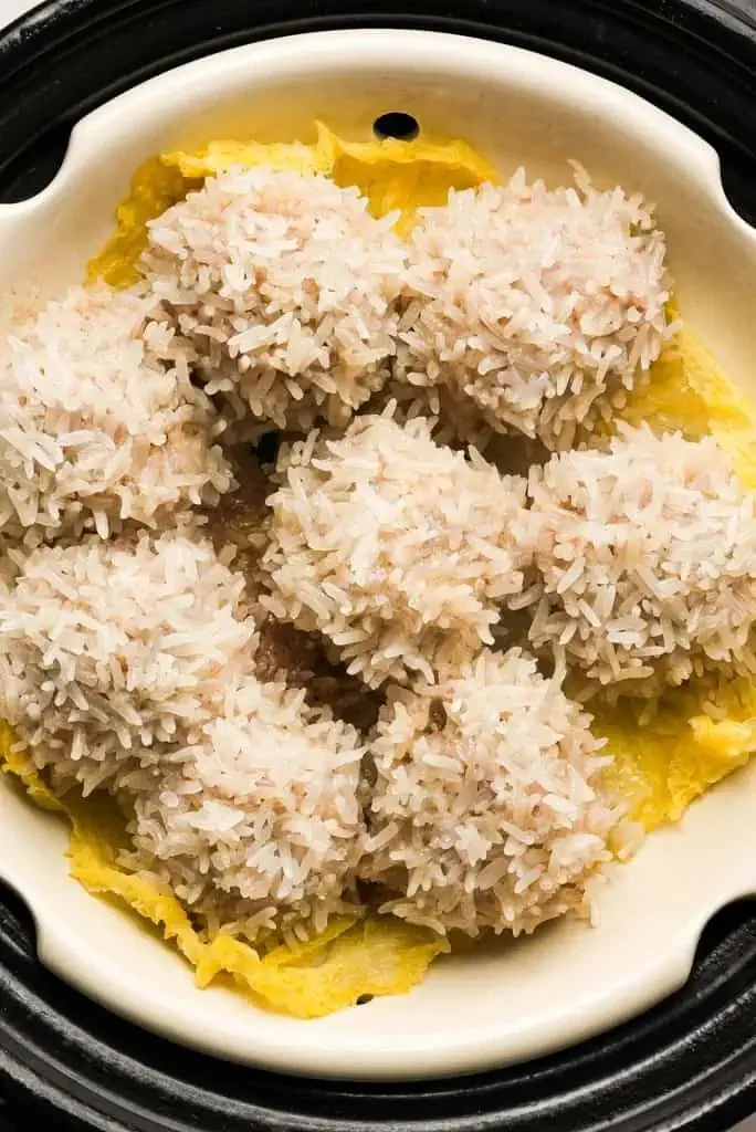 Delicious Chinese Pearl Meatballs served on a plate with garnishes