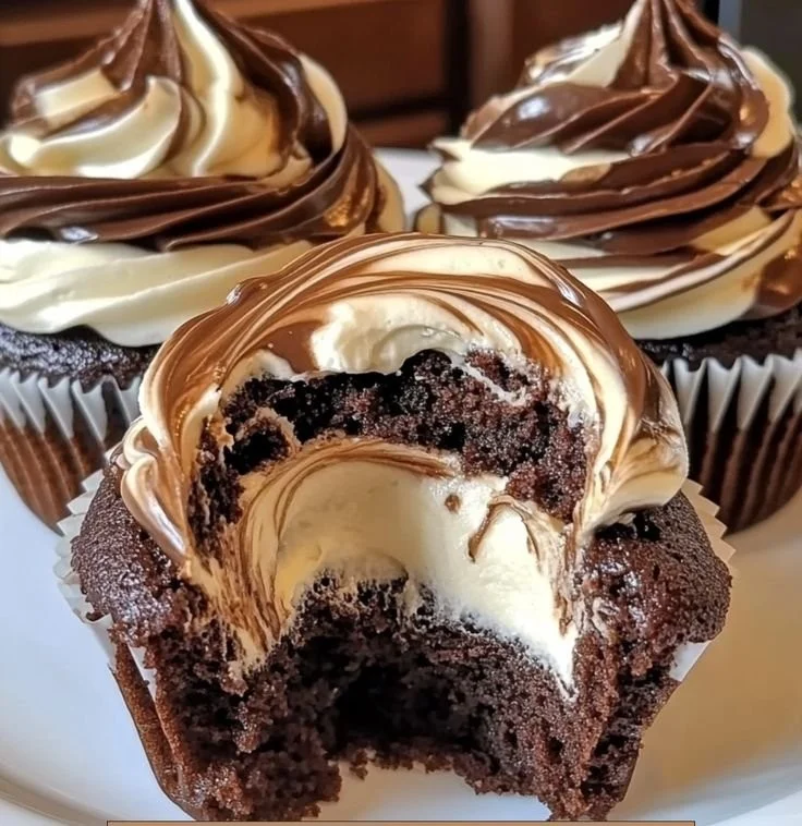 Delicious Chocolate Coffee Cream Cupcakes topped with creamy frosting