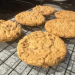 Plate of crispy oatmeal cookies fresh out of the oven