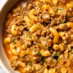 A bowl of homemade Hamburger Helper featuring pasta and ground beef.