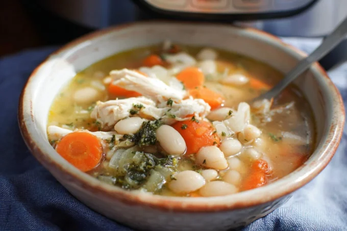 Bowl of healthy white bean chicken soup made in an Instant Pot