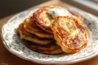 Crispy and golden brown mashed potato pancakes served with sour cream.