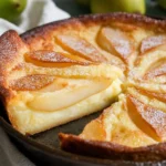 Homemade Pear Custard Pie with golden crust and sliced pears on top