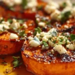 Roasted sweet potato rounds topped with honey and feta cheese