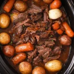 Delicious slow cooker pot roast with vegetables ready to serve.