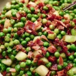 Thanksgiving peas with pancetta and pears served in a festive dish