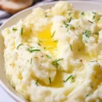 Creamy and delicious mashed potatoes served in a bowl