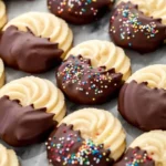 Freshly baked butter cookies on a cooling rack