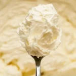 Delicious buttercream icing on vanilla and chocolate cupcakes