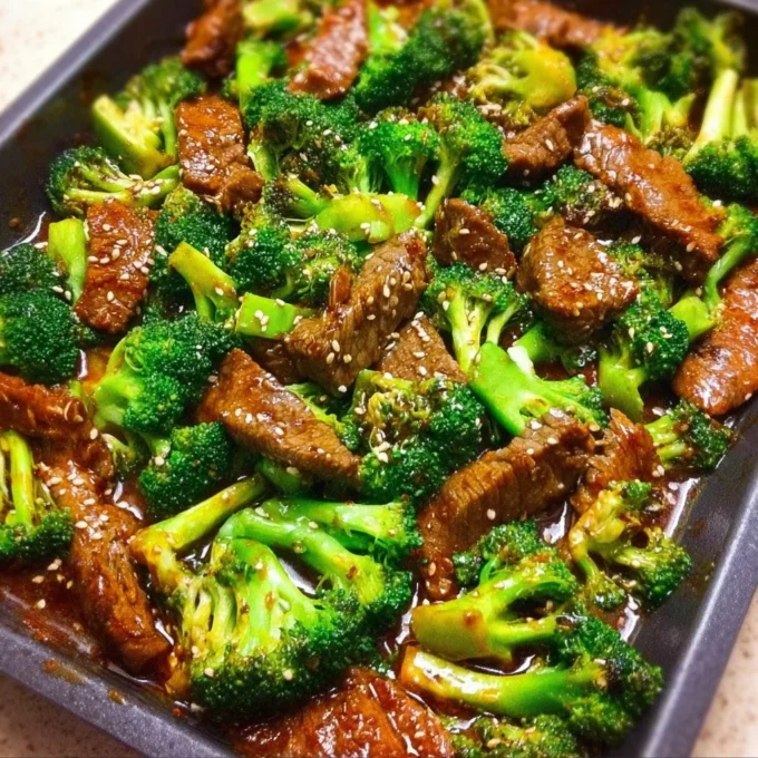 Delicious plate of Chinese Beef and Broccoli served with rice