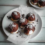 Delicious homemade chocolate marshmallow domes on a plate