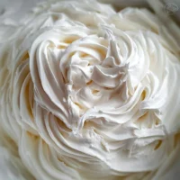 Delicious Cool Whip frosting on a cake topping