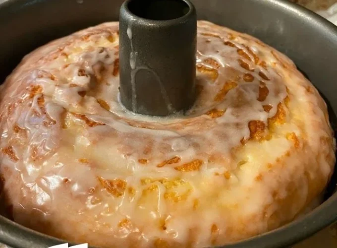 Slice of famous pound cake on a plate with strawberries