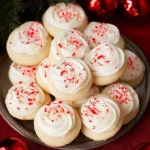 Plate of delicious peppermint meltaway cookies with a festive decoration.