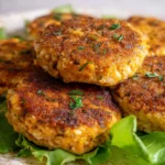 Delicious Southern salmon patties served with lemon and herbs.