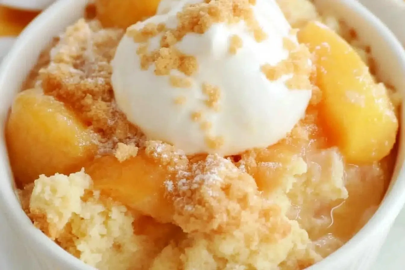 Delicious homemade Peach Cobbler with fresh peaches and golden crust