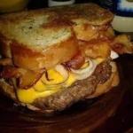 Delicious Beef and Cheese French Toast Sandwich served on a plate
