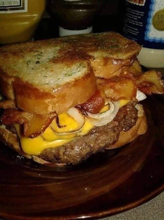 Delicious Beef and Cheese French Toast Sandwich served on a plate