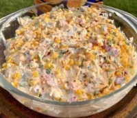 Delicious Cheesy Corn Bake dish garnished and ready to serve
