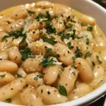 Creamy lemon-parmesan white beans served in a bowl