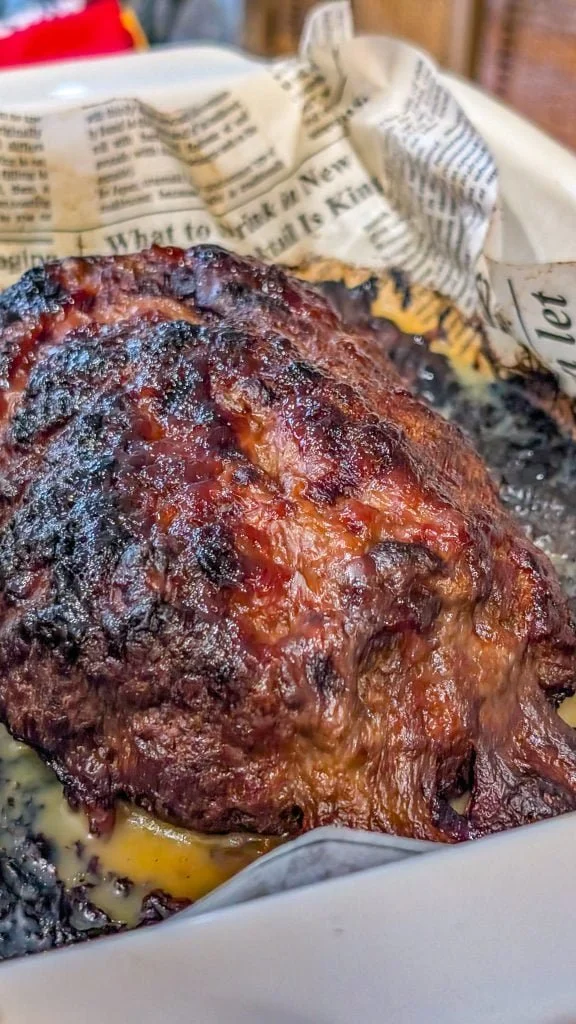 Delicious brown sugar meatloaf served with mashed potatoes and green beans.