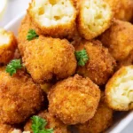 Delicious cheesy mac and cheese bites served as a tasty appetizer