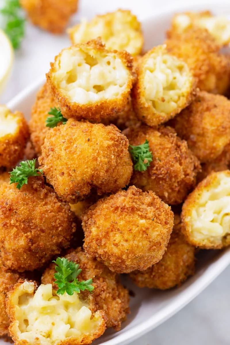 Delicious cheesy mac and cheese bites served as a tasty appetizer