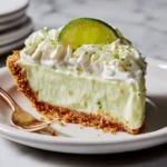 Classic key lime pie with fresh lime topping and graham cracker crust