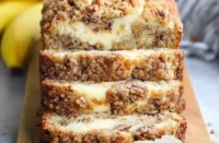 Cream cheese banana bread topped with crumb topping fresh out of the oven