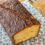 Slice of Hawaiian coconut pineapple sweet bread showcasing tropical ingredients