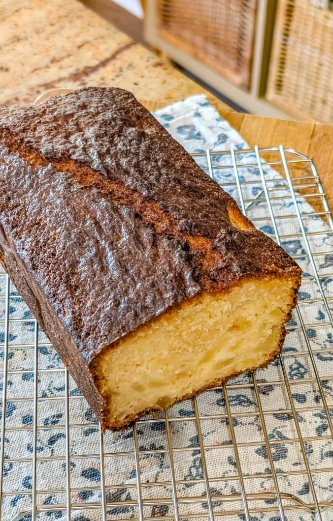 Slice of Hawaiian coconut pineapple sweet bread showcasing tropical ingredients