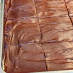 No Bake Chocolate Eclair Cake with layers of cream and chocolate icing