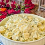 Delicious Southern potato salad in a bowl with parsley garnish