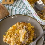 Delicious Walking Taco Casserole topped with cheese and fresh toppings.