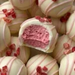Creamy strawberry white chocolate truffles with fresh strawberries and cocoa