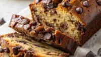 Extremely moist chocolate chip banana bread with melted chocolate chips