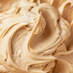 Delicious homemade peanut butter frosting on a cake