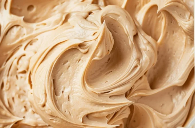 Delicious homemade peanut butter frosting on a cake