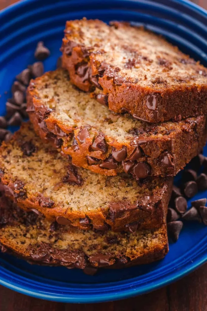 Delicious homemade banana bread with chocolate chips on a wooden table