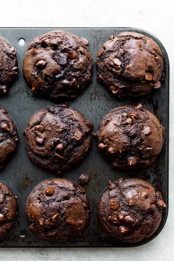 Decadent double-chocolate chip muffins fresh out of the oven